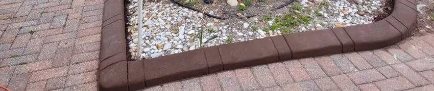 Custom-designed residential concrete landscape borders in Palm Beach, FL